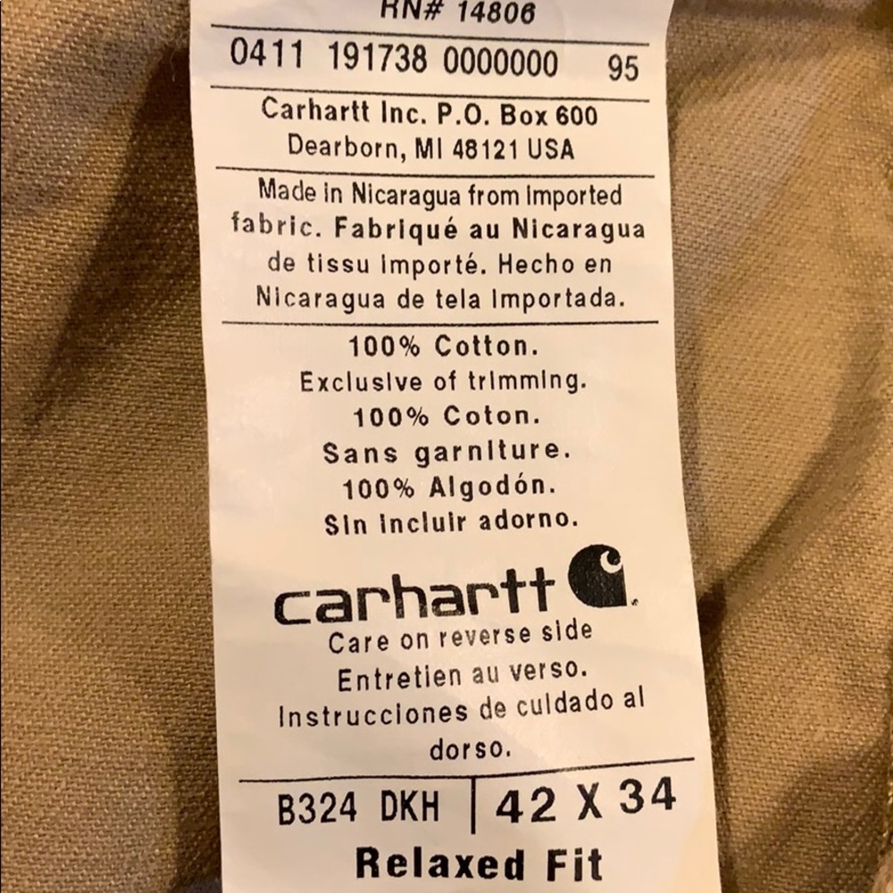 Carhartt jeans.   Have been hemmed to 29ish length